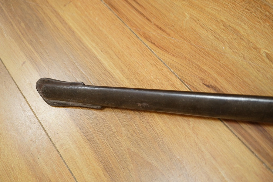 An 1845 pattern infantry officer’s sword by Henry Wilkinson, number 19387, regulation hilt, (fish skin covering missing), in its iron scabbard. Condition - fair to good.